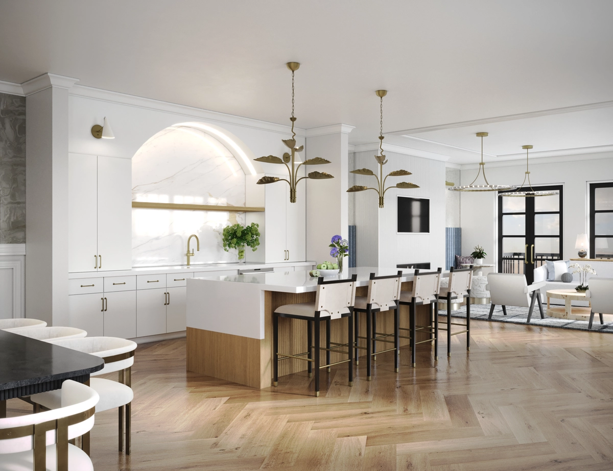 Elegant clubroom kitchen with white cabinetry, an arched marble backsplash, a wood-paneled island with bar seating, brass palm-leaf pendant chandeliers, herringbone hardwood floors, and an open lounge area beyond