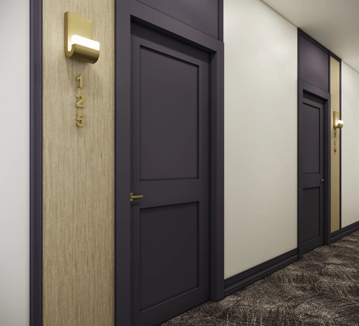Residential corridor with dark charcoal paneled doors, brass door handles and room number plaques, wood-grain accent wall panels with gold sconce lighting, and patterned carpet flooring